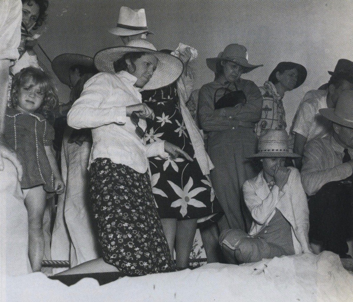 Audience watches while police search for a body