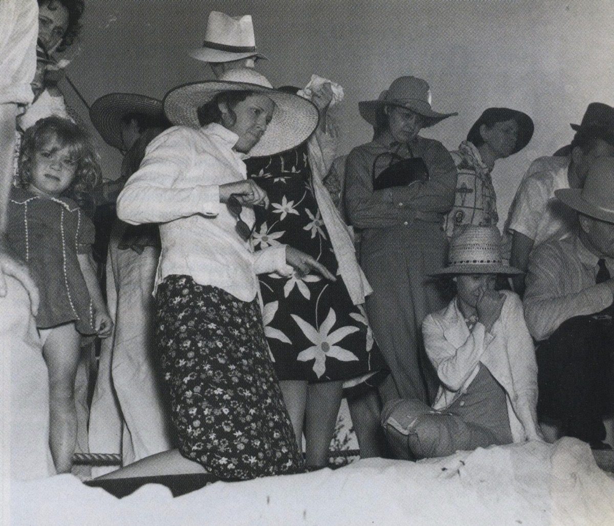 Audience watches while police search for a body