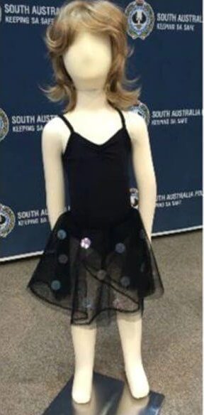 Clothes found at scene / mannequin and suitcase shown at press conference