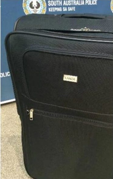 Clothes found at scene / mannequin and suitcase shown at press conference