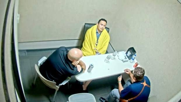 Thomas Perez Jr. in the interview room, from the police video