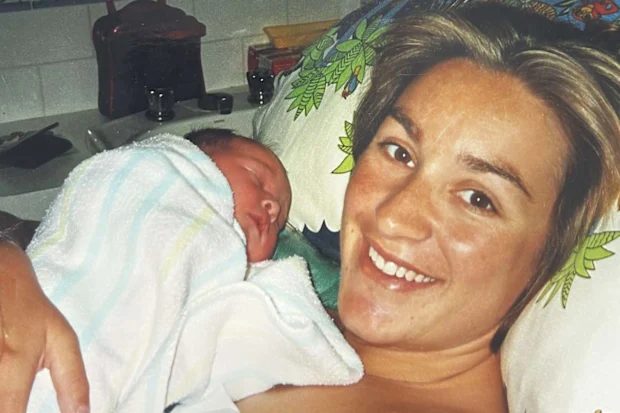Keli Lane with a newborn